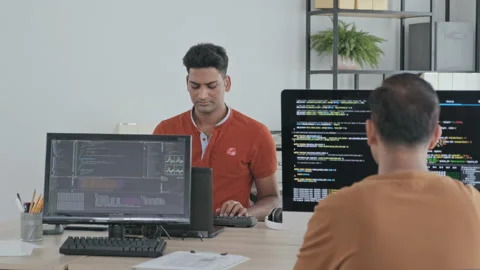 Indian Programmers Working with Program Codes in Office Stock Footage 203747200