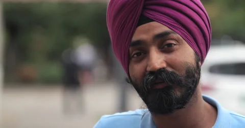 Indian Punjabi sheik man in city face portrait Stock Footage
