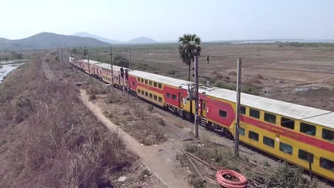 Indian Rails Double Decker Express Train speed countryside Aerial Vaitarna India Stock Footage 141928832