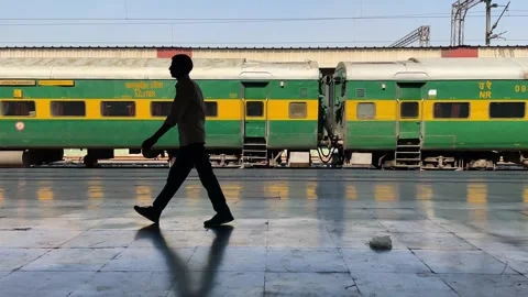 Indian Railway Station with Train on Platform: New Delhi, India - 02 28 2023 Stock Footage 333622208