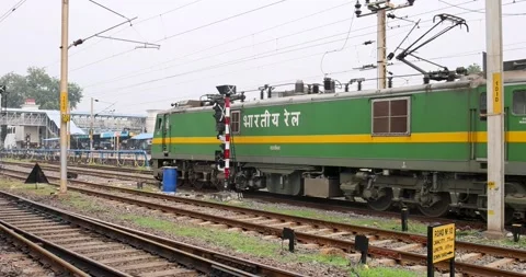 Indian Railway train passing through Vijayawada Junction railway station Stock Footage 221714436