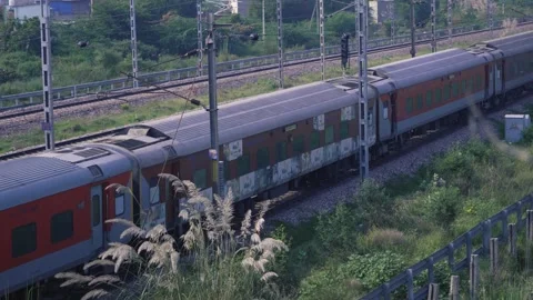 Indian Railway Train Passing Through Station Stock Footage 321025539