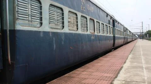 Indian railway train in platform Stock Photos