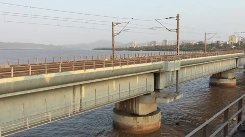 Indian Railways Empty Tracks and Concrete Bridge Over River Vídeos de archivo 335714427