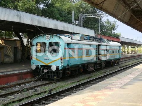 Indian railways old maintenance train engine wagon on rail station Mumbai India Stock Photos