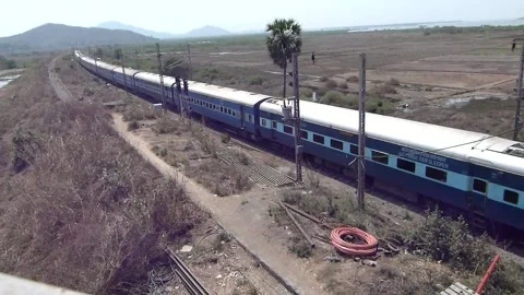Indian Railways Passenger Express Train speed countryside Vaitarna Mumbai India Stock Footage 141931563
