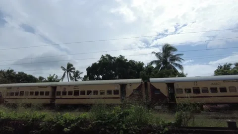Indian railways, train passing by Stock Footage 203643385