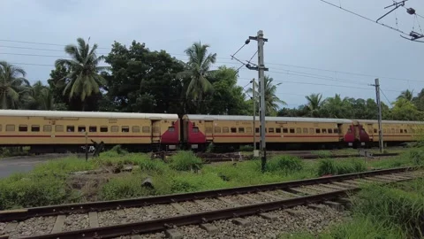 Indian railways, train passing by Stock Footage 207277579