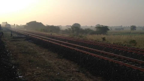 Indian Railways Train passing by on Tracks Stock Footage 71482844