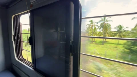 Indian Railways Train Window Showing Tropical Landscape. Stock Footage 346473070