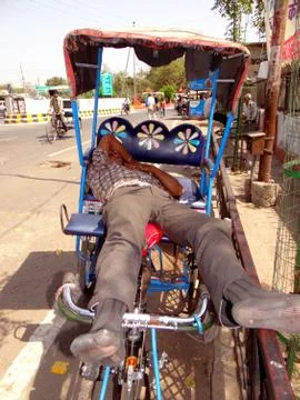 An Indian rickshaw puller Stock Photos