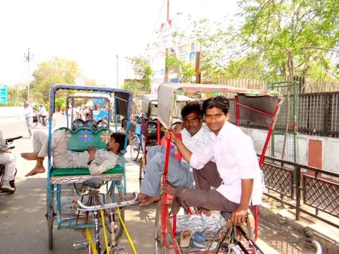 Indian rickshaw pullers Stock Photos