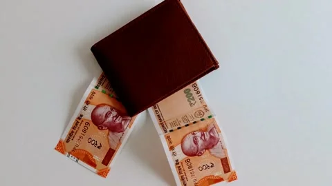 Indian Rupee 200 notes with brown wallet isolated on white Background 스톡 동영상 332276610