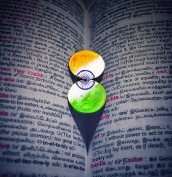 Indian rupee coins on the book 写真素材
