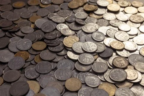Indian Rupee Coins Spread on Table Stock Photos