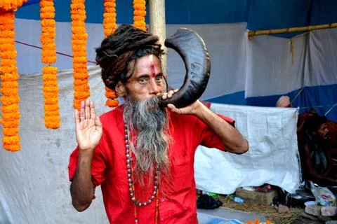 Indian sahdu yogi with horn. Stock Photos