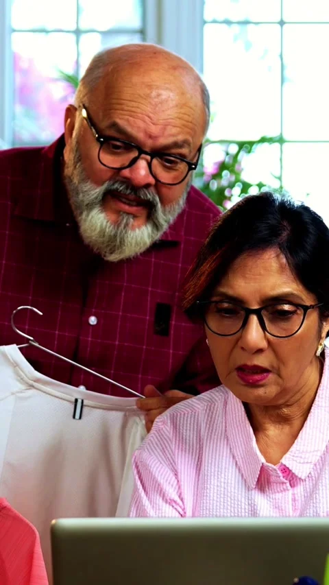Indian senior couple doing E-commerce business from home Stock Footage 342756561
