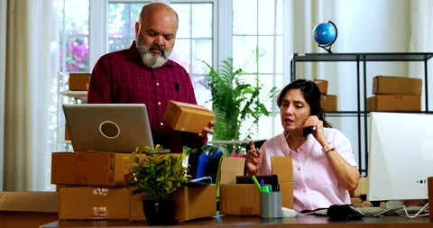 Indian senior couple doing E-commerce business from home Video stock 342779440