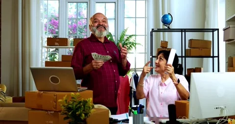 Indian senior couple doing E-commerce business from home Stock Footage 342779551