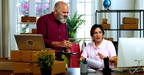 Indian senior couple doing E-commerce business from home Stock-Footage 342779579