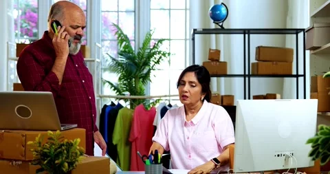 Indian senior couple doing E-commerce business from home Stock Footage 342779590