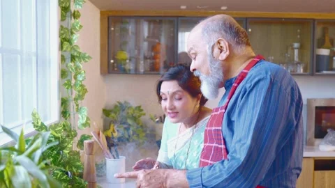 Indian senior couple indoor spending quality time together Stock Footage 343354591