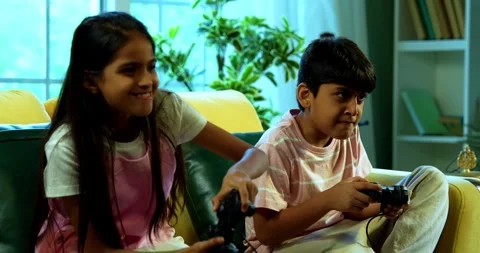 Indian small brother sister or siblings at home having fun and bonding time Stock Footage 342988198