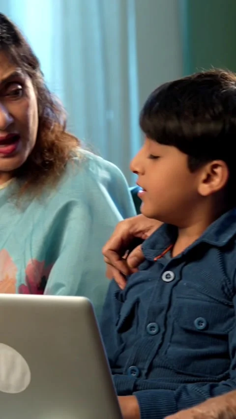 Indian small kid spending quality time with grandparents at home Video stock 342980507