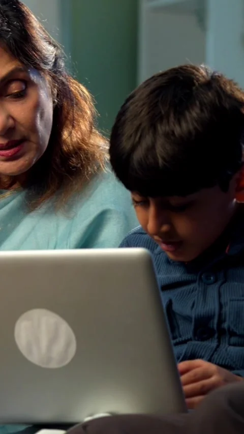 Indian small kid spending quality time with grandparents at home 스톡 동영상 342980553