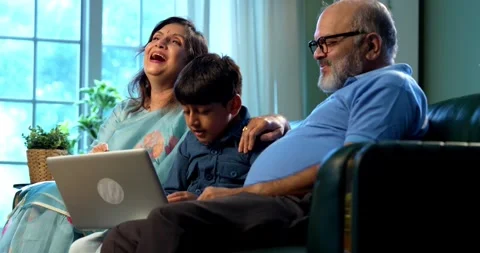 Indian small kid spending quality time with grandparents at home Stock Footage 342985905