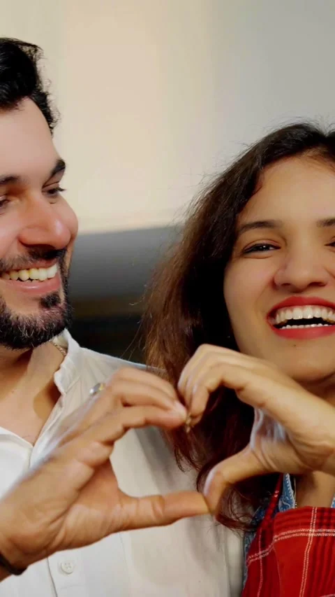 Indian smart young couple having quality time while cooking together Video stock 343416436