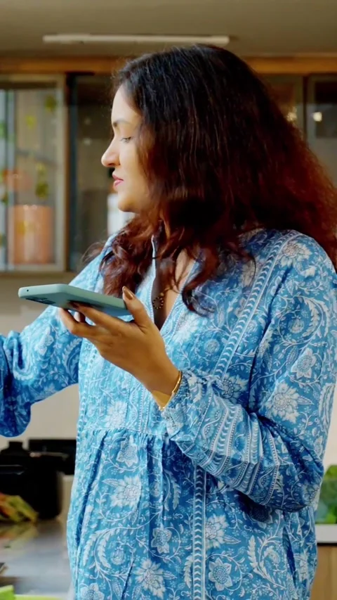 Indian smart young couple having quality time while cooking together Video stock 343416489