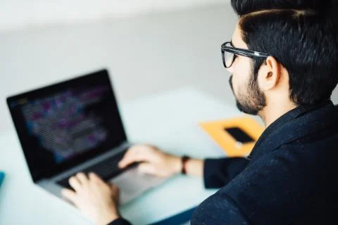 Indian software developer busy with work on new project. Indian programer wor 写真素材