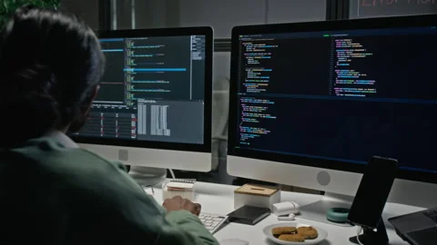 Indian Software Developer Programming on Multiple Computer Screens Stock Footage 348360567