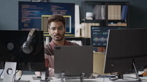 Indian Software Developer Working on Computer in IT Office Stock Footage 337487842