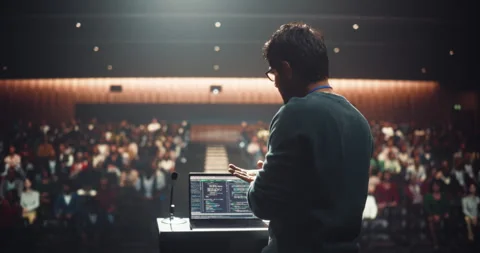 Indian Speaker Making a Presentation in Front of Audience Stock Footage 283439807