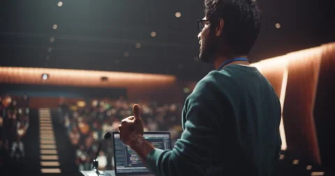 Indian Speaker Making a Presentation in Front of Audience Stock Footage 283440010