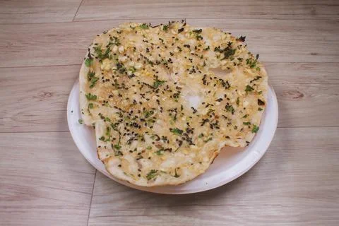 Indian special flat bread also known as tandoori roti or naan, served in a wh Stock Photos