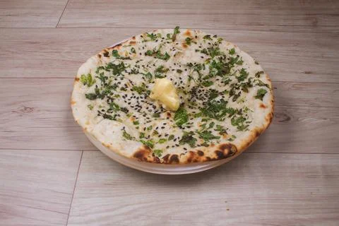 Indian special flat bread also known as tandoori butter kulcha or naan, serve Stock Photos