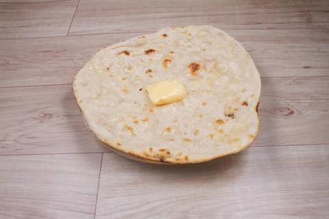 Indian special flat bread also known as butter tandoori roti or naan, served 스톡 사진