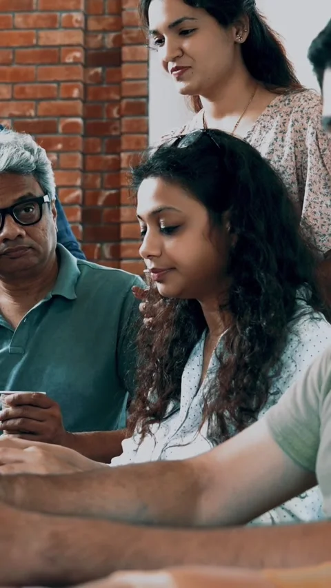 Indian startup programming team collaborating on laptops, computers Stock-Footage 342508066