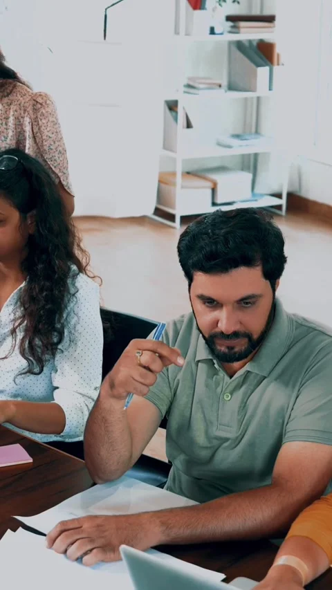 Indian startup programming team collaborating on laptops, computers Stock-Footage 342508118
