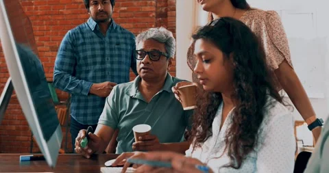 Indian startup programming team collaborating on laptops, computers Stock-Footage 342511263