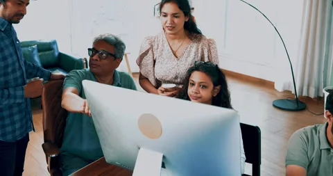 Indian startup programming team collaborating on laptops, computers Stock-Footage 342511310
