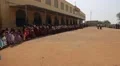 Indian students and teachers staying in the school yard in India HD Footage