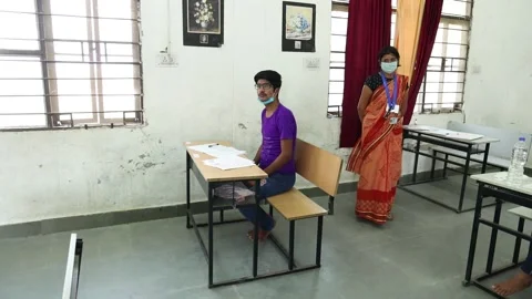 Indian Students in the Classroom Taking Exam/ Test wearing mask Stock Footage 139379300