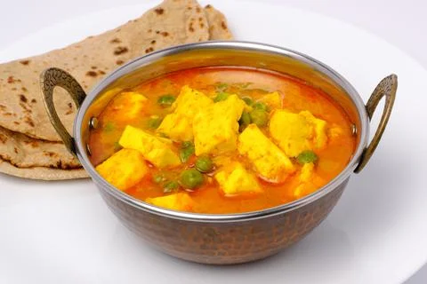 Indian style cottage cheese dish or curry with roti Stock Photos