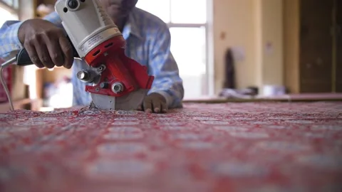 Indian tailor cuts a block printed Rajasthani cloth into shapes in a factory. Stock Footage 151905209