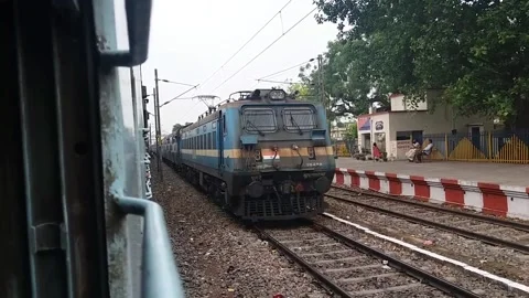 Indian train crossing the other train Stock Footage 139687951