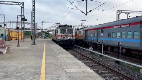 An Indian train engine approaching Varanasi railway station, Stock Footage 285832822